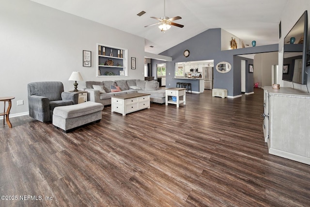361 SE 34th St, Keystone Heights, FL 32656 - living room with ceiling fan, dark wood-type flooring, lofted ceiling, and built in features