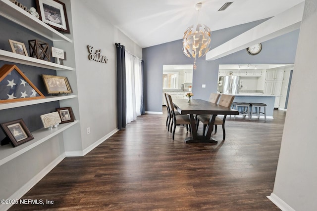 361 SE 34th St, Keystone Heights, FL 32656 - dining space with a chandelier, lofted ceiling, and wood finished floors