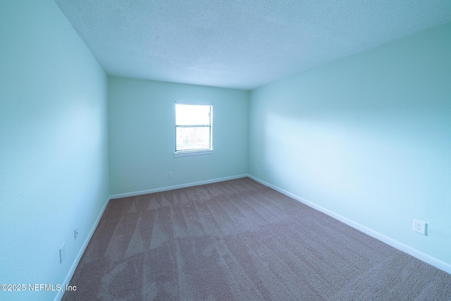 100 Fairway Park Blvd Unit 1004, Ponte Vedra Beach, FL 32082 - spare room with carpet flooring and a textured ceiling