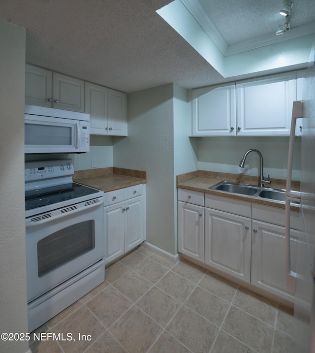 100 Fairway Park Blvd Unit 1004, Ponte Vedra Beach, FL 32082 - kitchen featuring white appliances, a textured ceiling, white cabinetry, light tile patterned flooring, and light countertops