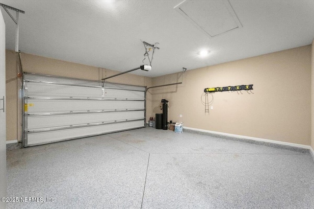 75570 Pondside Ln, Yulee, FL 32097 - garage with baseboards and a garage door opener