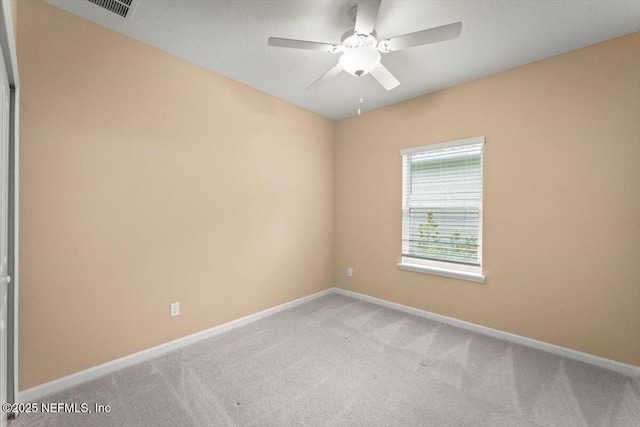 75570 Pondside Ln, Yulee, FL 32097 - spare room with light carpet and ceiling fan