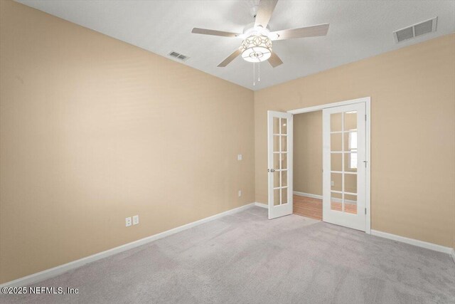 75570 Pondside Ln, Yulee, FL 32097 - unfurnished room with french doors, a ceiling fan, and carpet floors