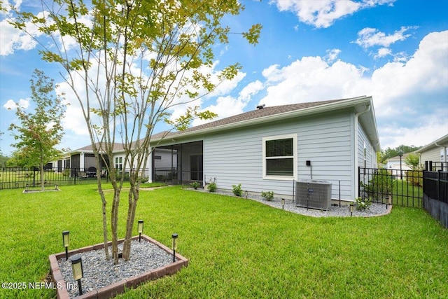 75570 Pondside Ln, Yulee, FL 32097 - back of house with a fenced backyard and a sunroom