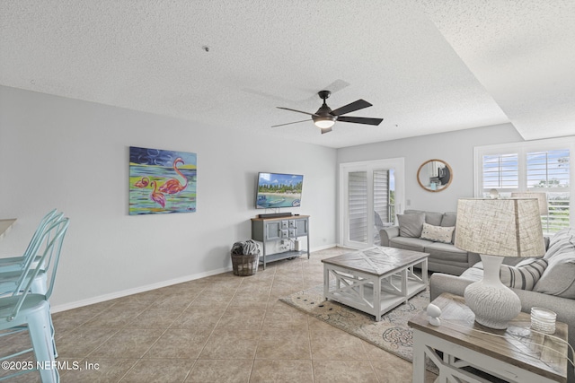 110 Ocean Hollow Ln Unit 114, Saint Augustine, FL 32084 - living area with a ceiling fan, tile patterned floors, and a textured ceiling