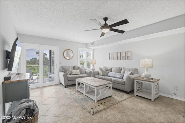 110 Ocean Hollow Ln Unit 114, Saint Augustine, FL 32084 - living area with a ceiling fan, tile patterned floors, and a textured ceiling
