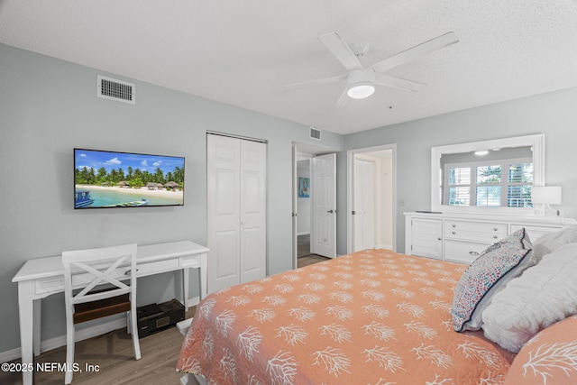 110 Ocean Hollow Ln Unit 114, Saint Augustine, FL 32084 - bedroom with wood finished floors, a closet, and a ceiling fan