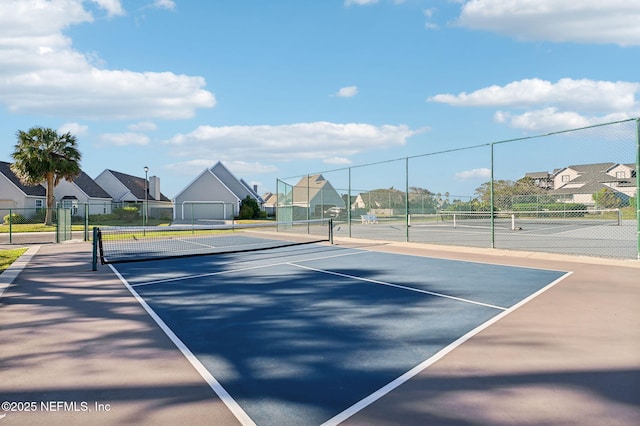 110 Ocean Hollow Ln Unit 114, Saint Augustine, FL 32084 - view of tennis court featuring a residential view and community basketball court