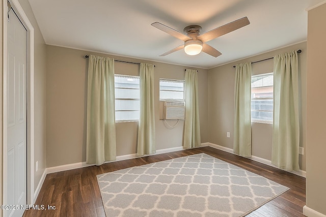 279 Selden Ave, Ormond Beach, FL 32174 - spare room featuring ceiling fan, crown molding, dark wood-style floors, and cooling unit