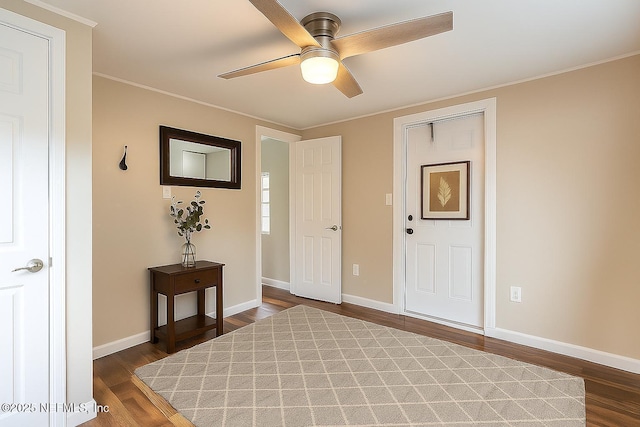 279 Selden Ave, Ormond Beach, FL 32174 - entryway with ceiling fan, dark wood finished floors, and ornamental molding