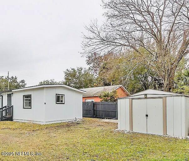 279 Selden Ave, Ormond Beach, FL 32174 - view of yard featuring a storage shed