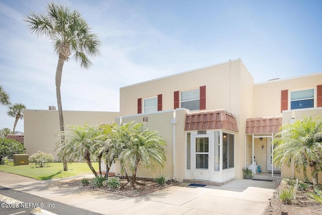 7265 S A1A Unit B8, Saint Augustine, FL 32080 - view of front of property with stucco siding