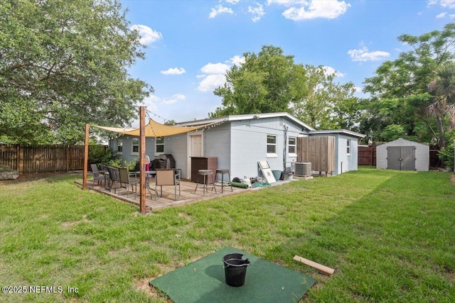 325 Sargo Rd, Atlantic Beach, FL 32233 - rear view of property with a storage shed, an outdoor fire pit, and a patio
