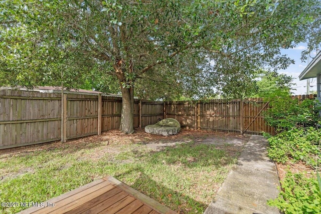 325 Sargo Rd, Atlantic Beach, FL 32233 - fenced backyard featuring a wooden deck