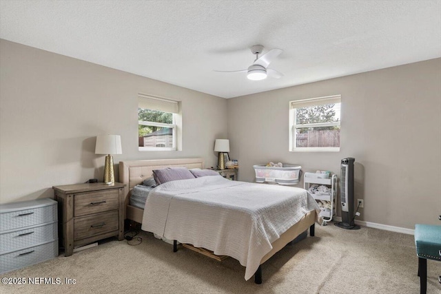 325 Sargo Rd, Atlantic Beach, FL 32233 - bedroom with multiple windows, light carpet, and ceiling fan