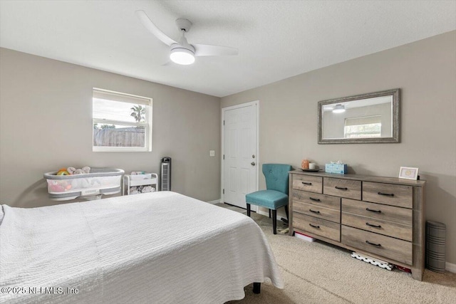 325 Sargo Rd, Atlantic Beach, FL 32233 - carpeted bedroom with a ceiling fan and baseboards