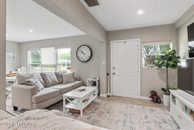 325 Sargo Rd, Atlantic Beach, FL 32233 - living area featuring healthy amount of natural light, wood finished floors, and recessed lighting