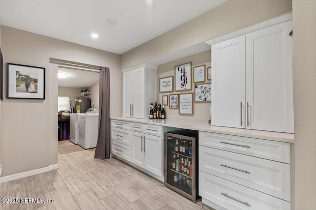 325 Sargo Rd, Atlantic Beach, FL 32233 - indoor dry bar with wine cooler and washing machine and clothes dryer