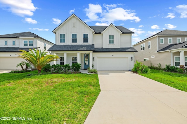 347 Ness Cir, Saint Augustine, FL 32095 - view of front facade featuring board and batten siding, driveway, a garage, and a front yard