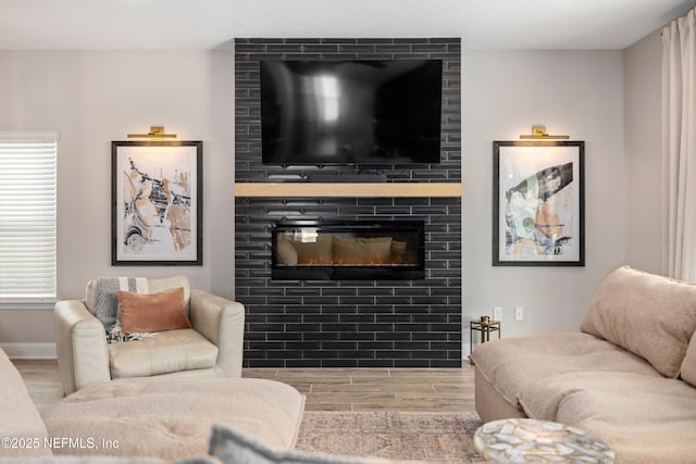 347 Ness Cir, Saint Augustine, FL 32095 - living area featuring wood finished floors and a fireplace