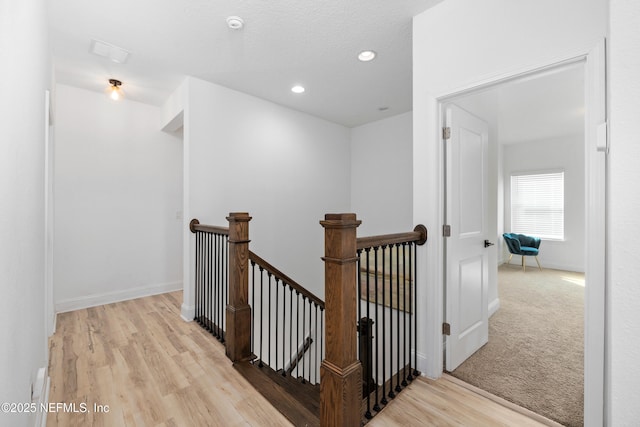 347 Ness Cir, Saint Augustine, FL 32095 - hall featuring an upstairs landing, light wood-style flooring, and recessed lighting