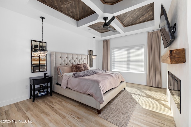 347 Ness Cir, Saint Augustine, FL 32095 - bedroom with coffered ceiling, light wood finished floors, a chandelier, beam ceiling, and ceiling fan
