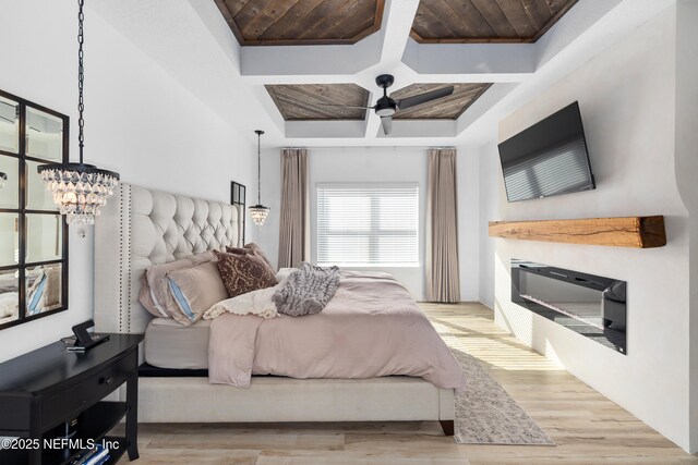 347 Ness Cir, Saint Augustine, FL 32095 - bedroom with coffered ceiling, wood finished floors, and a chandelier