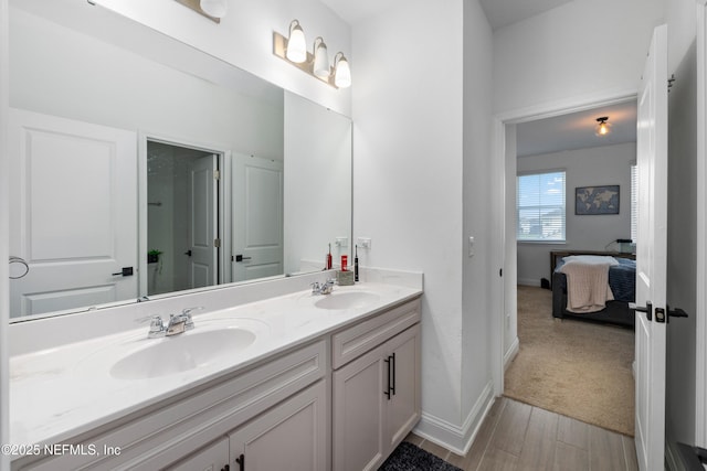 347 Ness Cir, Saint Augustine, FL 32095 - ensuite bathroom with double vanity and wood finished floors