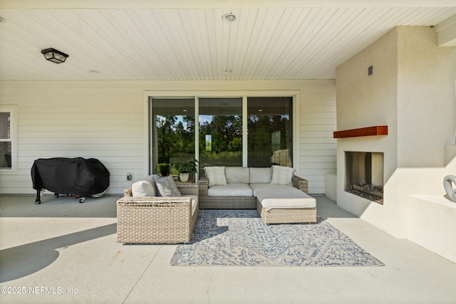 347 Ness Cir, Saint Augustine, FL 32095 - view of patio featuring an outdoor living space with a fireplace and a grill