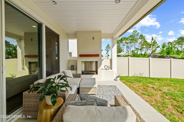 347 Ness Cir, Saint Augustine, FL 32095 - view of patio / terrace with an outdoor living space with a fireplace