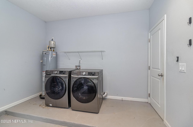4725 Melanie St, Hastings, FL 32145 - laundry area featuring water heater and washing machine and clothes dryer
