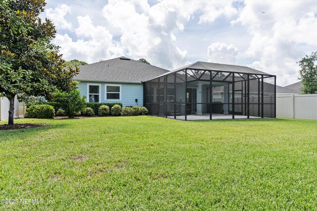 12206 Orange Grove Dr, Jacksonville, FL 32223 - back of house with a patio, a lanai, and a shingled roof