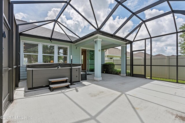 12206 Orange Grove Dr, Jacksonville, FL 32223 - view of patio / terrace featuring a hot tub and glass enclosure