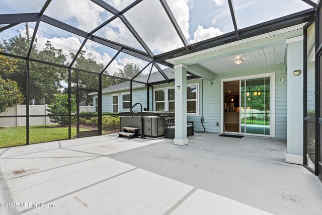 12206 Orange Grove Dr, Jacksonville, FL 32223 - view of patio with a hot tub and glass enclosure