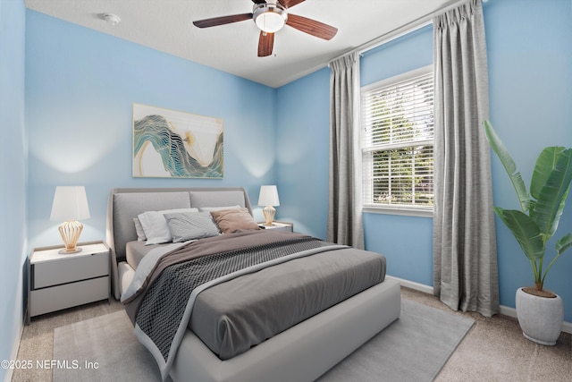 12206 Orange Grove Dr, Jacksonville, FL 32223 - carpeted bedroom with baseboards and a ceiling fan