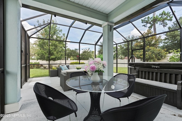 12206 Orange Grove Dr, Jacksonville, FL 32223 - view of patio / terrace featuring a lanai, a hot tub, and outdoor dining area