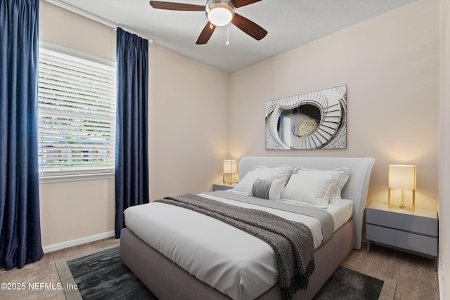 12206 Orange Grove Dr, Jacksonville, FL 32223 - carpeted bedroom with baseboards and a ceiling fan