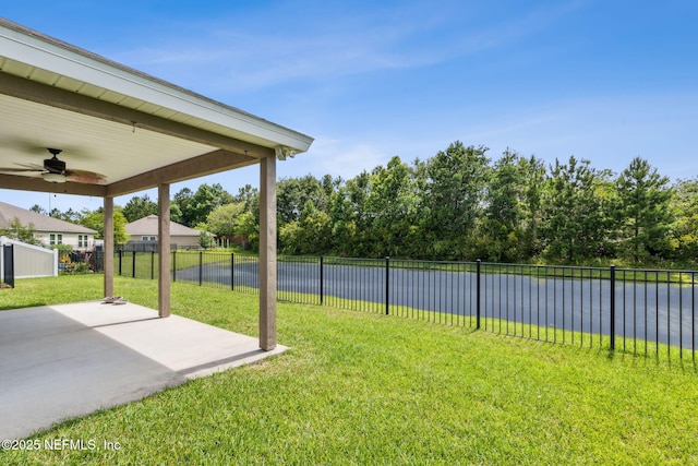 7250 Steventon Way, Jacksonville, FL 32244 - fenced backyard with ceiling fan and a patio area