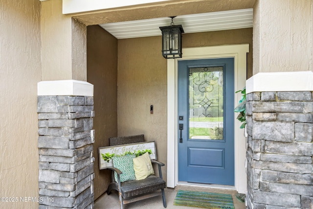 7250 Steventon Way, Jacksonville, FL 32244 - view of exterior entry with stucco siding