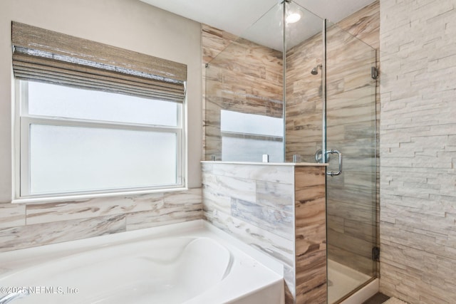 7250 Steventon Way, Jacksonville, FL 32244 - bathroom featuring a stall shower and a bath