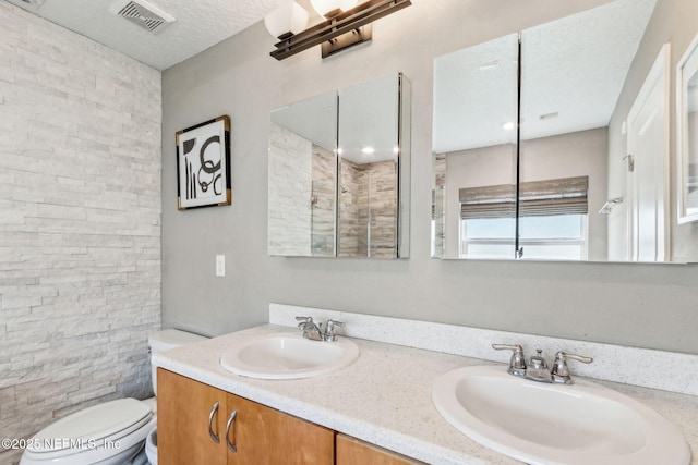 7250 Steventon Way, Jacksonville, FL 32244 - bathroom featuring toilet and double vanity