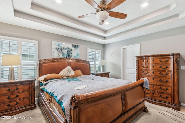 7250 Steventon Way, Jacksonville, FL 32244 - bedroom featuring light carpet, a raised ceiling, recessed lighting, and a ceiling fan
