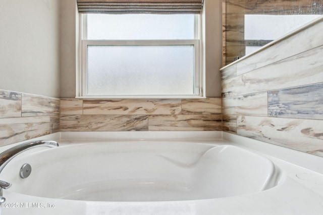 7250 Steventon Way, Jacksonville, FL 32244 - bathroom with healthy amount of natural light and a bath