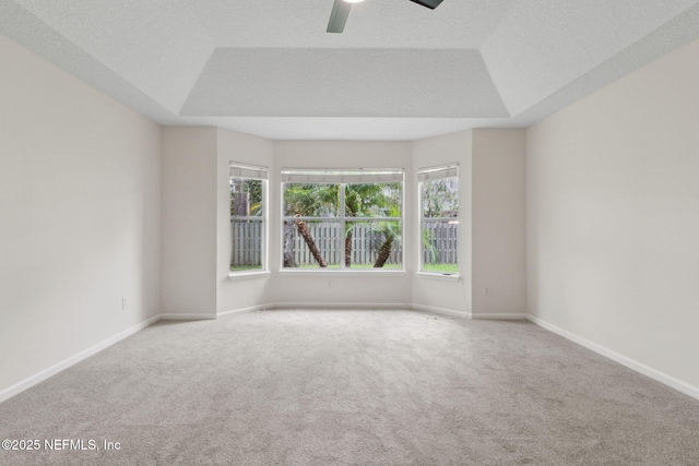 1912 Bluebonnet Way, Fleming Island, FL 32003 - carpeted spare room with a tray ceiling and ceiling fan