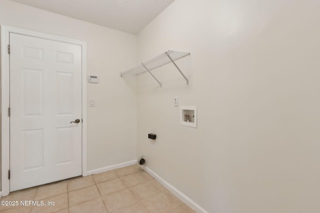 1912 Bluebonnet Way, Fleming Island, FL 32003 - laundry room with washer hookup, light tile patterned flooring, and electric dryer hookup
