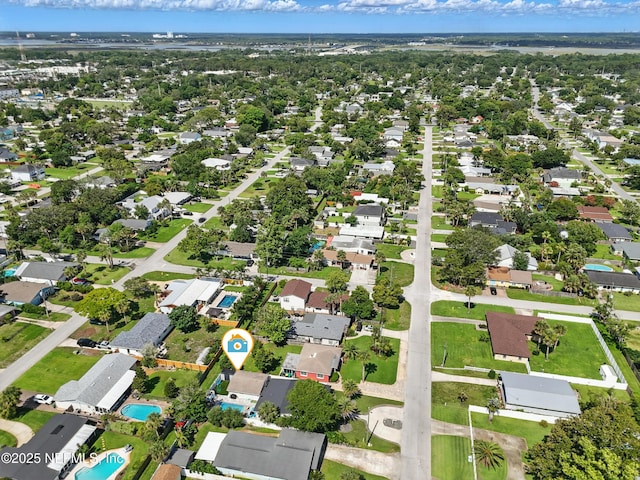 622 7th Ave N, Jacksonville Beach, FL 32250 - aerial view of property and surrounding area featuring a pool and nearby suburban area
