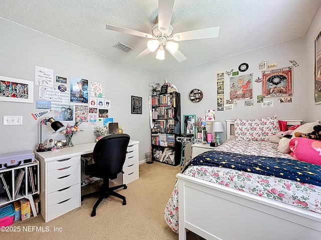 78151 Duckwood Trl, Yulee, FL 32097 - bedroom with light colored carpet, a textured ceiling, and ceiling fan