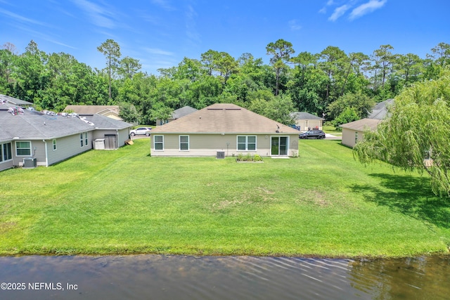 78151 Duckwood Trl, Yulee, FL 32097 - rear view of house featuring a water view and a yard