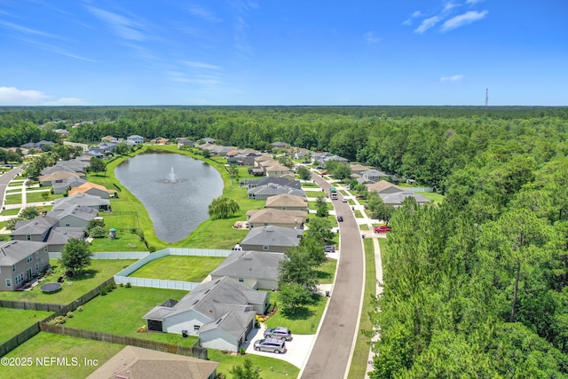 78151 Duckwood Trl, Yulee, FL 32097 - aerial perspective of suburban area with a heavily wooded area and a large body of water