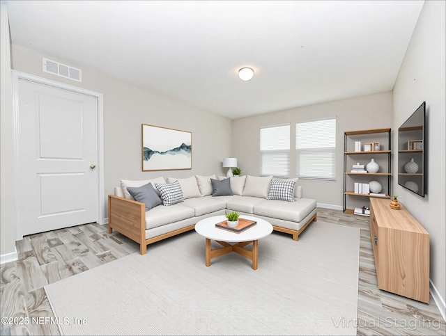 154 Moorcroft Way, Saint Augustine, FL 32092 - living room with light wood-type flooring and baseboards